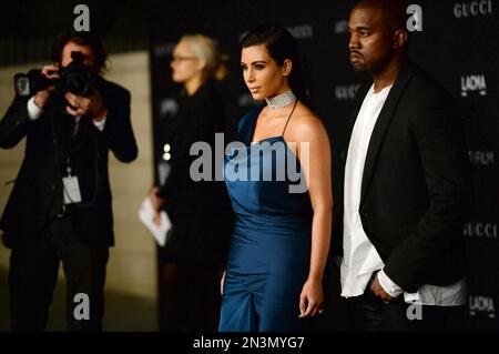 Kanye West and Kim Kardashian taking a walk at Cannes port around