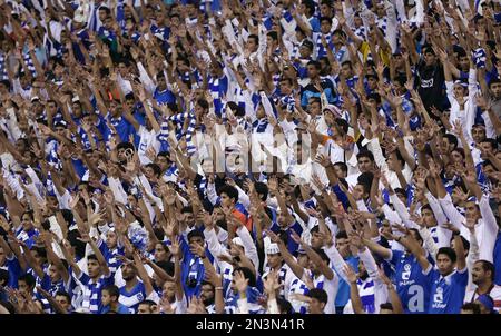 Saudi Arabia's Al Hilal soccer team players celebrate their trophy of the  AFC Champions League 2021 after the team beats South Korea's Pohang  Steelers 2-0 during their final soccermatch at the King