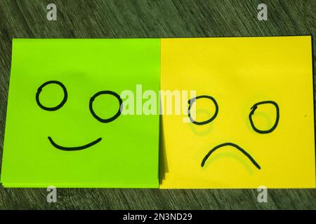 conceptual image for a be different or be happy concept using sticky notes Stock Photo