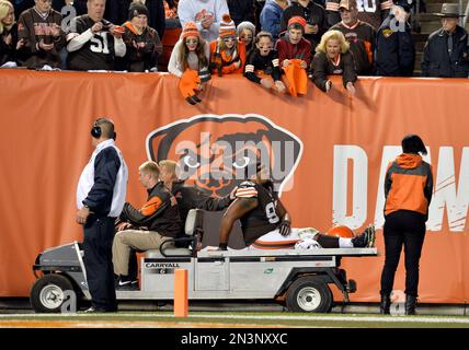 Cleveland Browns defensive end John Hughes walks off the field