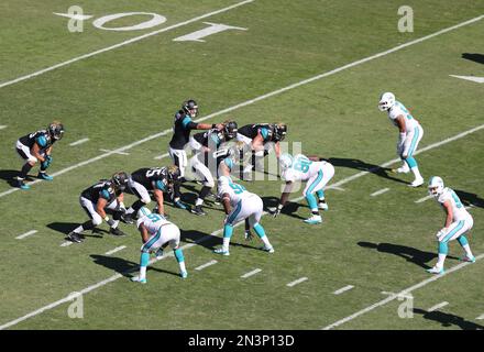 Jacksonville Jaguars players kneel in prayer in the end zone before an NFL  football game against the Arizona Cardinals, Sunday, Sept. 26, 2021, in  Jacksonville, Fla. (AP Photo/Phelan M. Ebenhack Stock Photo 