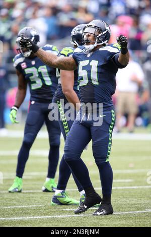 Seattle Seahawks linebacker Bruce Irvin (51) and Los Angeles Chargers  linebacker Khalil Mack (52) chat after an NFL football game, Sunday, Oct.  23, 2022, in Inglewood, Calif. (AP Photo/Kyusung Gong Stock Photo - Alamy