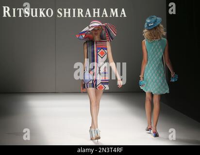 Models display creations designed by Ritsuko Shirahama during the