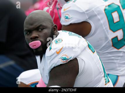 Miami Dolphins defensive tackle Anthony Moten (43) attempts to