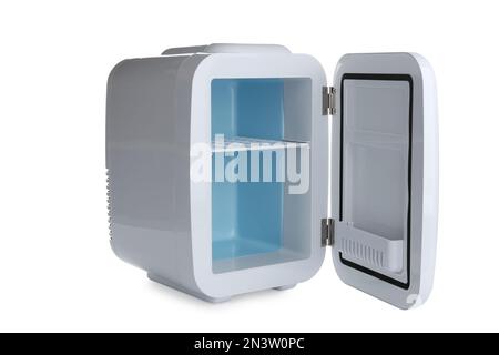 Open mini refrigerator for cosmetics isolated on white Stock Photo