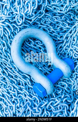 Steel eyelet with screw bolt and chain, Portofino harbour, Portofino, Liguria, Italy Stock Photo