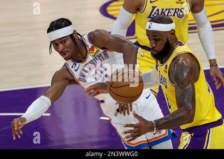 Los Angeles, California, USA. 7th Feb, 2023. Oklahoma City Thunder guard Shai Gilgeous-Alexander (2) and Los Angeles Lakers forward LeBron James (6) fight for the ball during an NBA basketball game, Tuesday February 7, 2023, in Los Angeles. (Credit Image: © Ringo Chiu/ZUMA Press Wire) EDITORIAL USAGE ONLY! Not for Commercial USAGE! Stock Photo