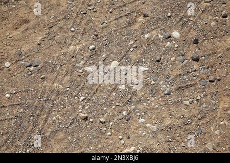 Car tracks on a sand in summer, abstract background Stock Photo