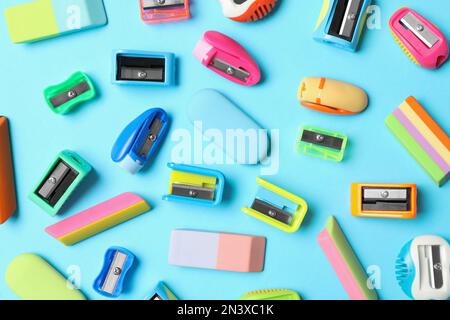 Flat lay composition with different school stationery on light blue background. Back to school Stock Photo