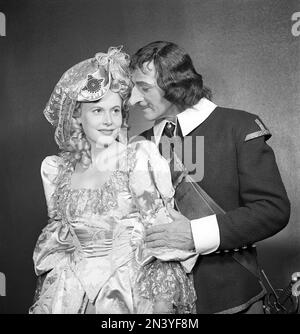 In the 1940s. Actors Birgit Tengroth and Edvin Adolphson pictured in their stage costums when appearing in the play Cyrano de Bergerac as Bergerac and Roxane. The large nose is significant for the role, it causes him to doubt himself and prevents him from expressing his love his distand cousin, the beautiful and intellectual Roxane. Sweden 1947 Kristoffersson ref AD22-8 Stock Photo