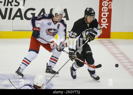 Pittsburgh Penguins' Kasperi Kapanen (42) celebrates his third goal of the team's  NHL hockey game against the Minnesota Wild, during the third period in  Pittsburgh, Saturday, Nov. 6, 2021. The Wild won