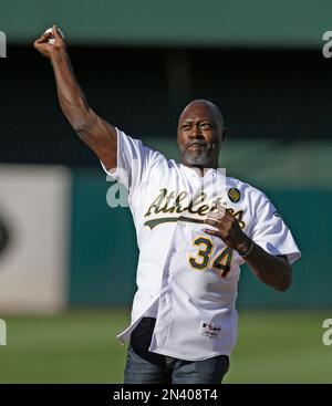 April 1, 2011; Oakland, CA, USA; Former Oakland Athletics pitcher Dave  Stewart throws out the ceremonial first pitch before the game against the  Seattle Mariners at Oakland-Alameda County Coliseum Stock Photo - Alamy