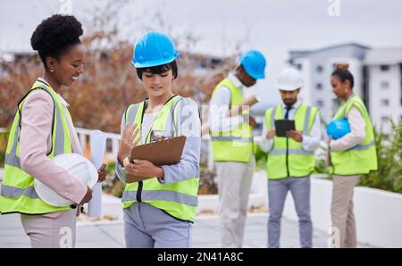 Industry, inspection and construction team with a clipboard for a maintenance, repair or building project. Collaboration, teamwork and industrial Stock Photo