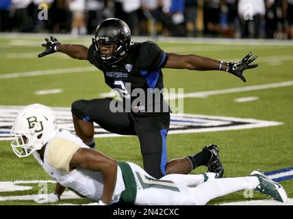 Buffalo defensive back Okezie Alozie breaks up a pass intended for Kent ...