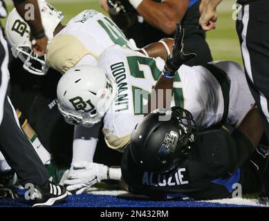 Buffalo defensive back Okezie Alozie breaks up a pass intended for Kent ...