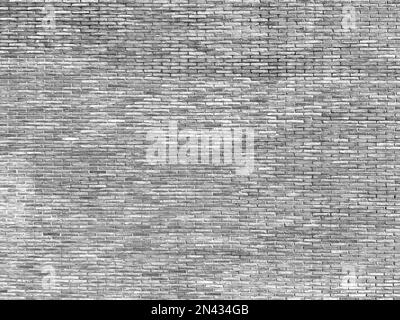 Wall with exposed solid ceramic brick aged by time. solid brick large scale texture. Stock Photo
