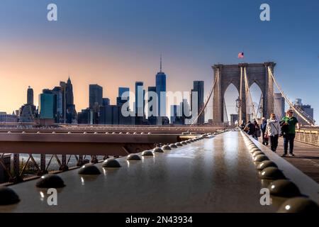 Brooklyn, New York, USA - April 25, 2022: The New York skyline viewed from Brooklyn bridge Stock Photo