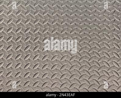 Black shiny background with convex ovals arranged in rows. Stock Photo