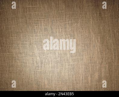 Abstract background with a gradient of rough fabric, backlit by a lantern. Stock Photo
