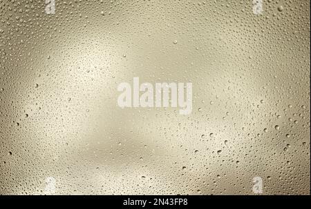 Glowing gray transparent background with contrasting water drops. Stock Photo