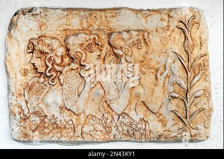 Weathered cretan decorative plate on wall, Crete Greece Stock Photo