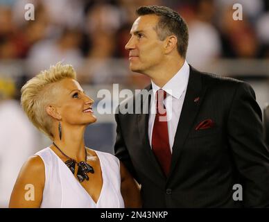 Brenda Warner, wife of Arizona Cardinals quarterback Kurt Warner, claps for  her husband after he scored a touchdown in the second quarter against the  St. Louis Rams at the Edward Jones Dome