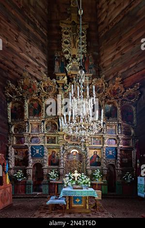 Iconostasis of the wooden Holy Trinity Church in suburb of Zhovkva, Ukraine Stock Photo