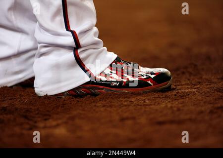 The shoes of Philadelphia Phillies' Bryce Harper are seen as he stands at  first during the sixth inning of a baseball game against the Washington  Nationals, Thursday, Sept. 2, 2021, in Washington.