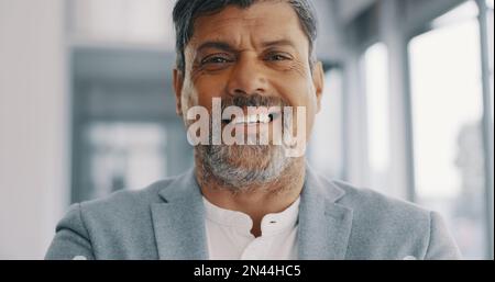 CEO, face or senior businessman with leadership, success mindset or corporate experience in office building. Mentor, portrait or happy Indian manager Stock Photo