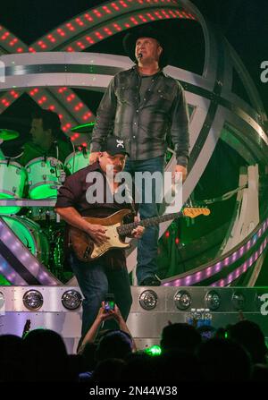 Band members performing for country music star and celebrity musician Jamey  Johnson at Farm Aid, in East Troy, Wisconsin, USA Stock Photo - Alamy