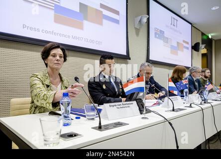 THE HAGUE - Digna van Boetzelaer (Netherlands), Andy Kraag (Netherlands), David McLean (Australia), Asha Hoe Soo Lian (Malaysia), Eric van der Sypt (Belgium), Oleksandr Bank (Ukraine) prior to a presentation of the Joint Investigation Team (JIT) of results in the ongoing investigation into those involved in the downing of flight MH17. It concerns an investigation into the crew of the missile installation that brought down the aircraft and those responsible for the delivery of the weapon system. ANP SEM VAN DER WAL netherlands out - belgium out Stock Photo