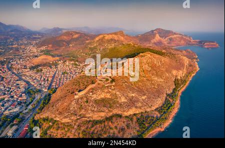 View from flying drone of fortress of Palamidi. Splendid evening view of Peloponnese peninsula, Greece, Europe. Amazing summer cityscape of Nafplion t Stock Photo