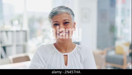 Face, leadership and senior business woman in office ready for task, targets or goals. Boss, ceo and happy, confident and proud female laughing with Stock Photo