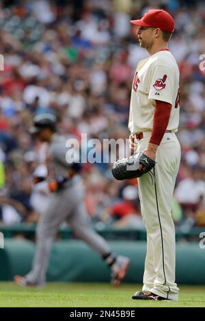 Cleveland Indians' Victor Martinez waits for play to resume