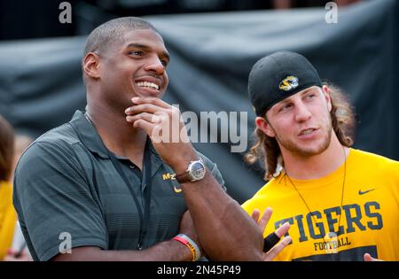 St. Louis Rams T.J. Moe watches the video replay board from the