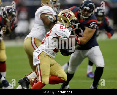 San Francisco 49ers LaMichael James (23) eludes Miami Dolphins