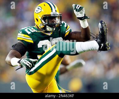 Green Bay Packers' Chris Banjo (32) and Aaron Ripkowski (22) fire up the  crowd after a kickoff return against the Washington Redskins during the  second half of their NFC Wild Card game