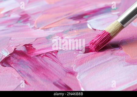 Abstract colorful paint and brush, closeup view Stock Photo