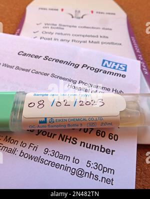Early bowel cancer screening programme sample, dated, prepared and ready to post, North West England, UK Stock Photo