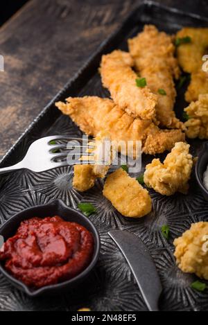 Chicken nuggets, strips and bites Stock Photo