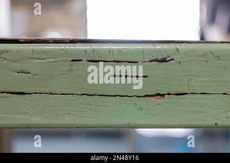 Close-up view of the termites damage on the wooden shelf. Stock Photo