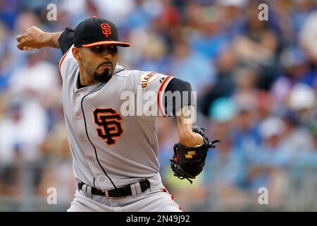 The San Francisco Giants' Sergio Romo dons a championship shirt after an  8-4 win over the San Diego Padres to clinch the NL West at AT&T Park in San  Francisco, California, on