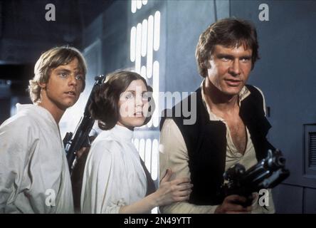 Star Wars  Star Wars Episode IV : A New Hope  Mark Hamill, Carrie Fisher & Harrison Ford  Luke Skywalker, Princess Leia, Han Solo Stock Photo