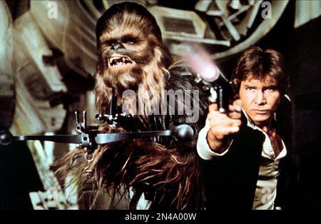 Star Wars  Star Wars Episode IV : A New Hope  Peter Mayhew & Harrison Ford  Chewbacca & Han Solo Stock Photo
