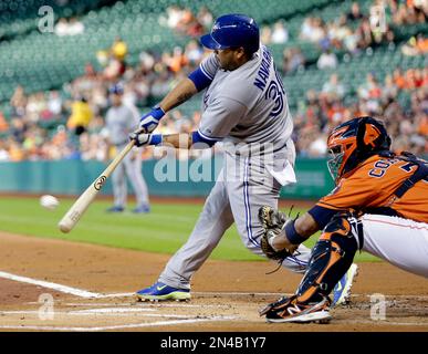 Houston Astros batter Carlos Coporan hits a two-RBI double during