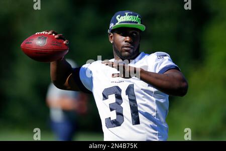 Kam Chancellor (31) of the Seattle Seahawks defends Owen Daniels (81) of  the Houston Texans on a pass that was deflected an intercepted in the first  half of their game on Sunday