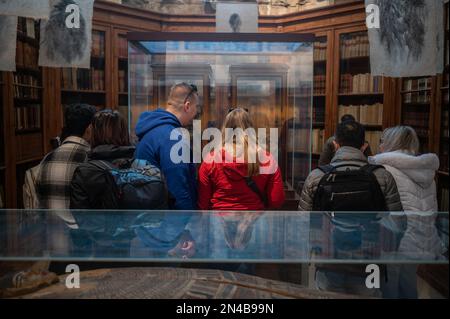 Visitors surprised with mummy of a girl and a boy at The Carmo Archaeological Museum (MAC), located in Carmo Convent, Lisbon, Portugal Stock Photo