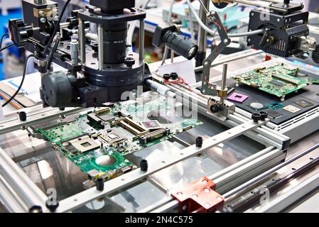 Electronic boards and chips and industrial microscope Stock Photo