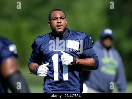 Seattle Seahawks wide receiver/kick off specialists Percy Harvin (11)  returns the opening kickoff against the Chicago Bears 46 yards in the  quarter of a pre-season game at CenturyLink Field in Seattle, Washington