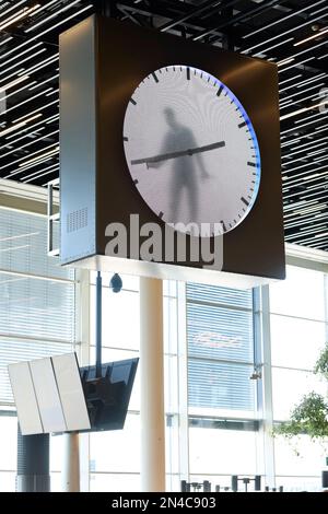 Clock display inside Schiphol Airport, Amsterdam Stock Photo